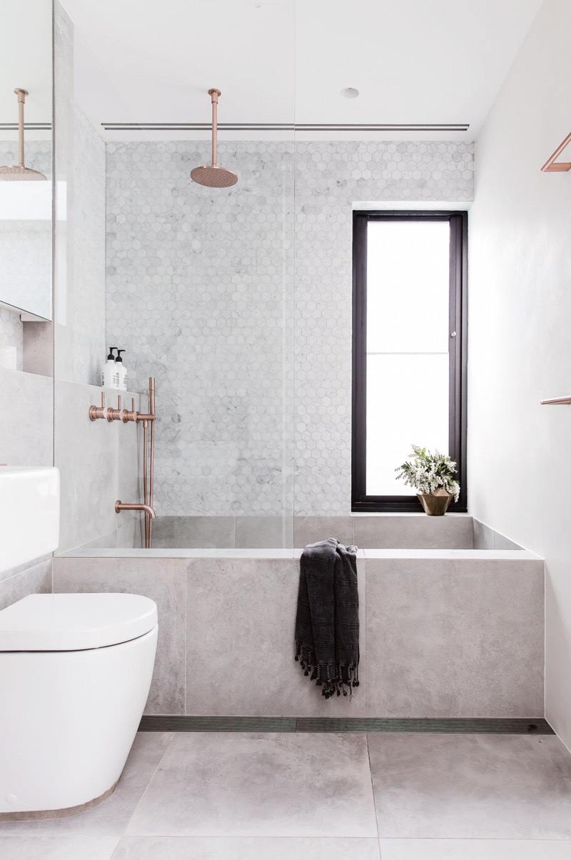 Concrete Bathtub and Tile Backsplash