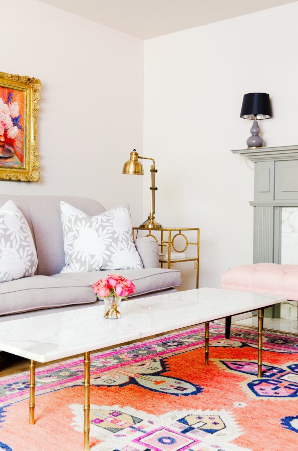 Choose bright and printed rugs that pop and add pattern to your living room.​