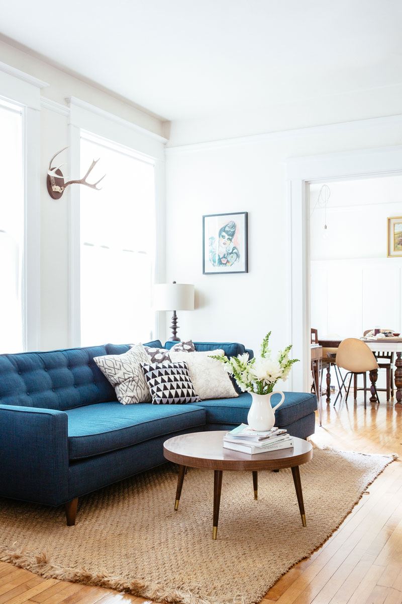 Blue Sofa & Brown Rug