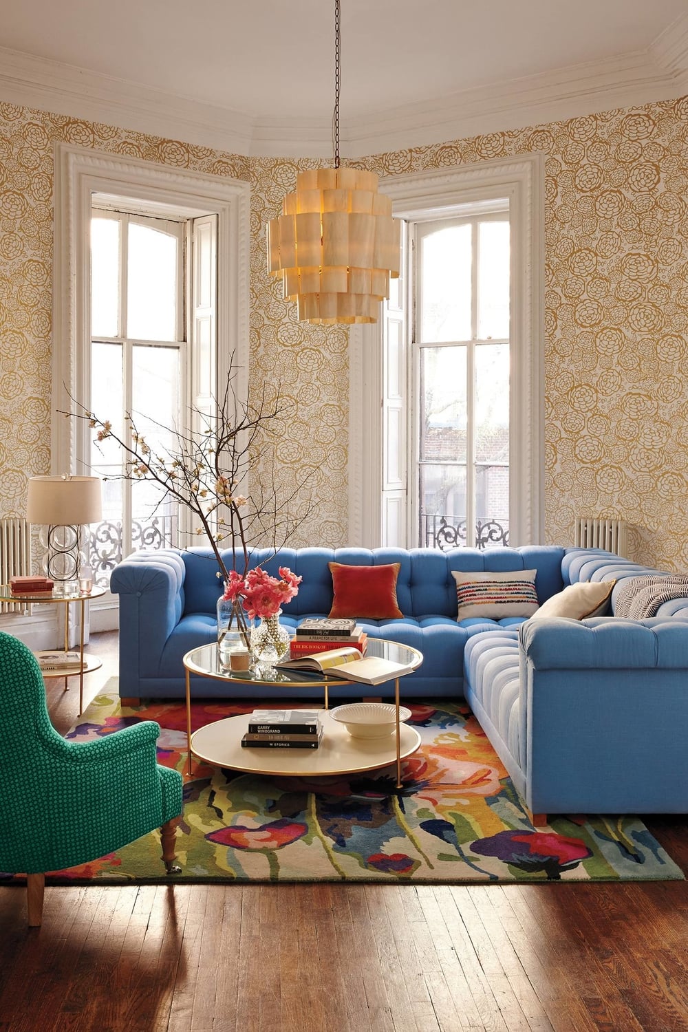 Blue Sofa and Floral Rug