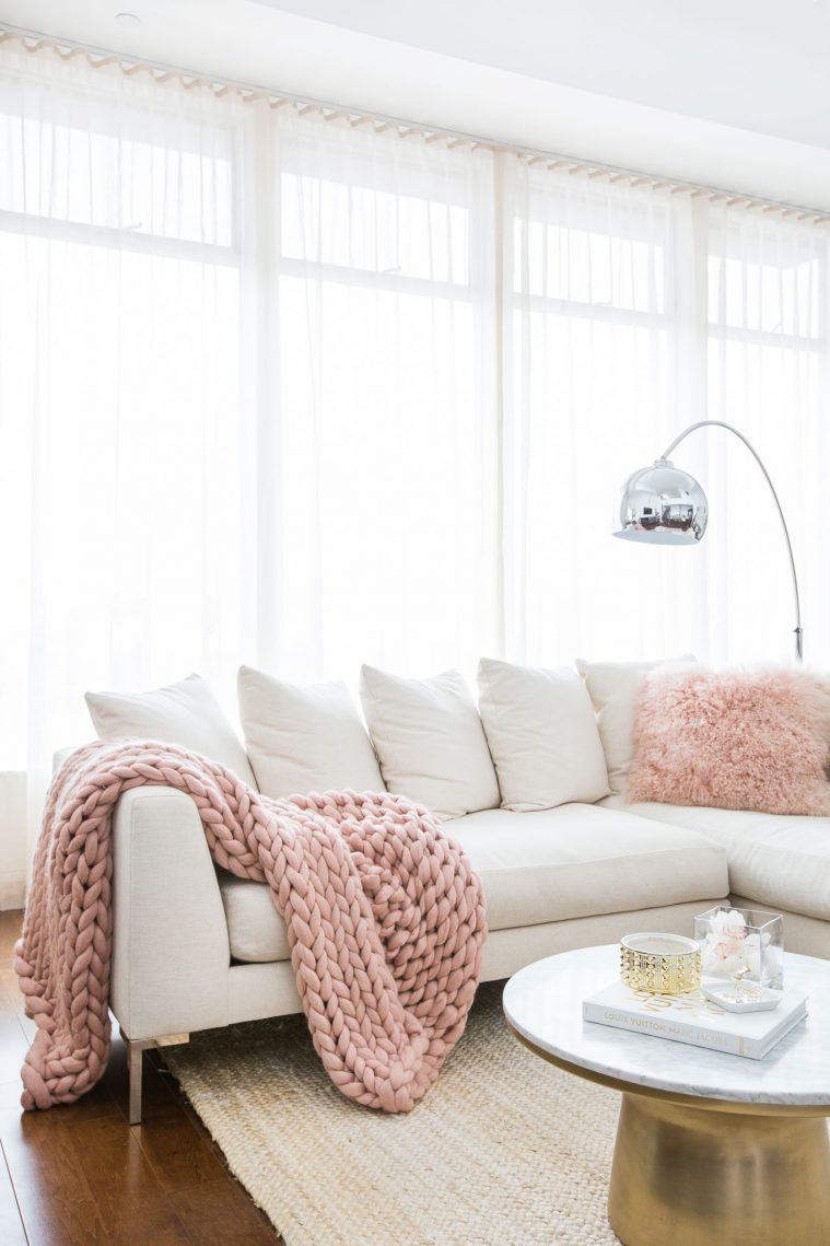 Neutral Couch and Pink Chunky Knit Blanket