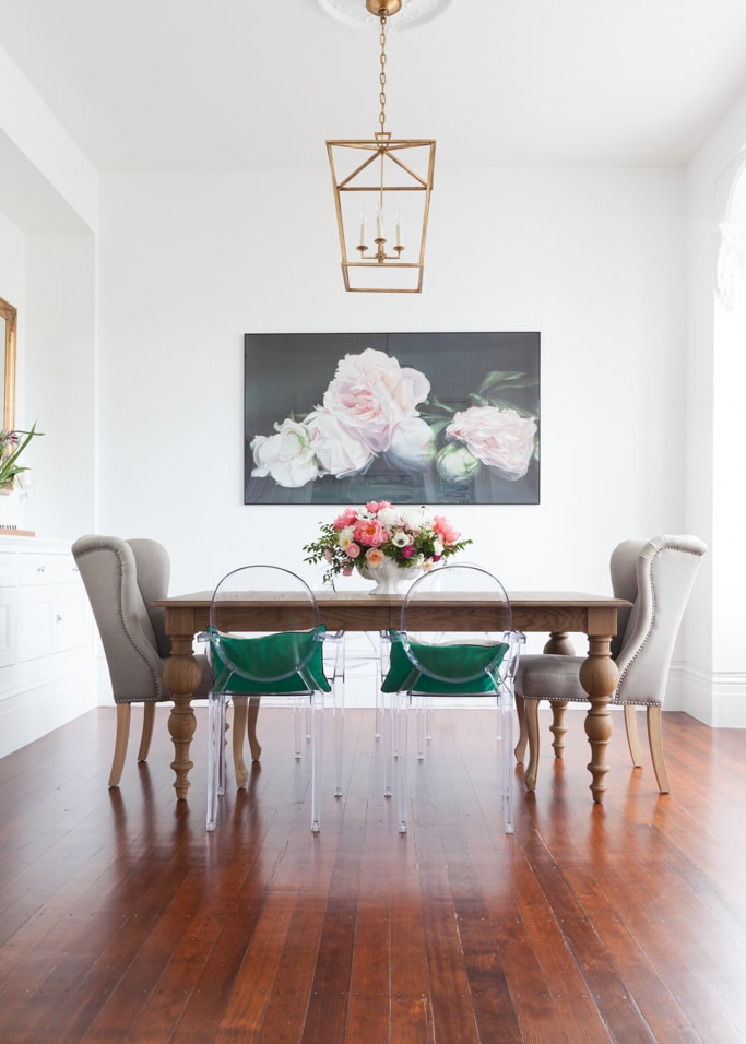 Dining Table with Wingback Style Chairs and Ghost Chairs