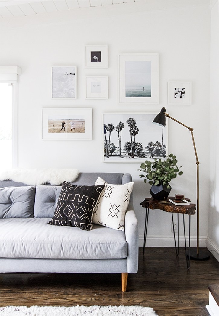 Artwork with red, orange, and yellow hues in living room