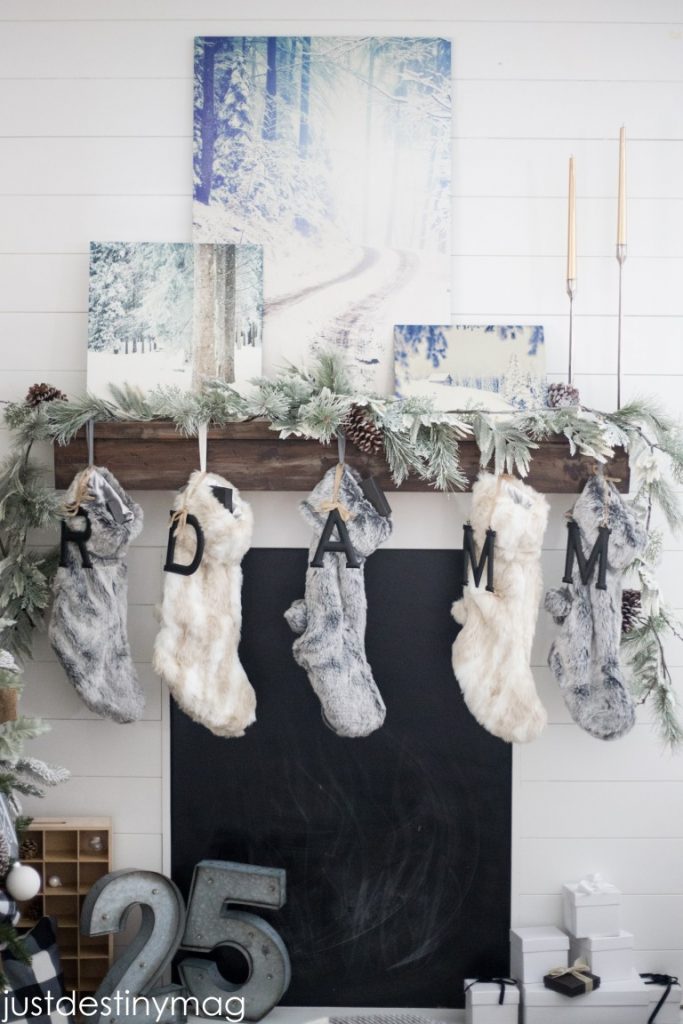 Winter Fireplace Decor with Fur Stockings and Marquee Lights​