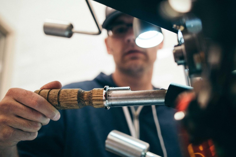 A plumber doing the repair works.