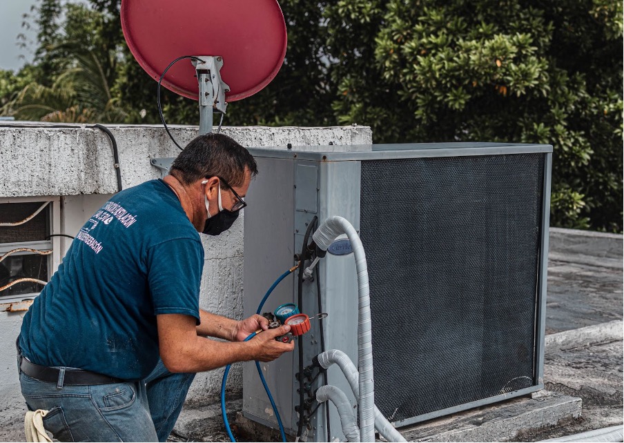 A man checking the temperature.