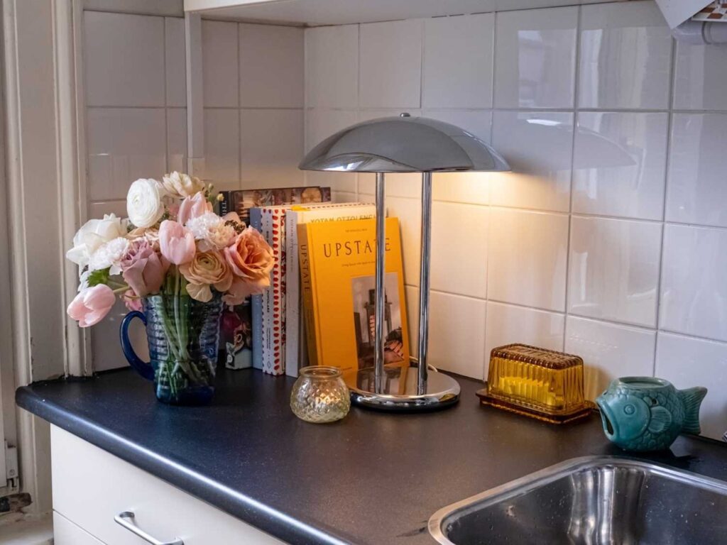 A Stack of Cookbooks With a Decorative Accent